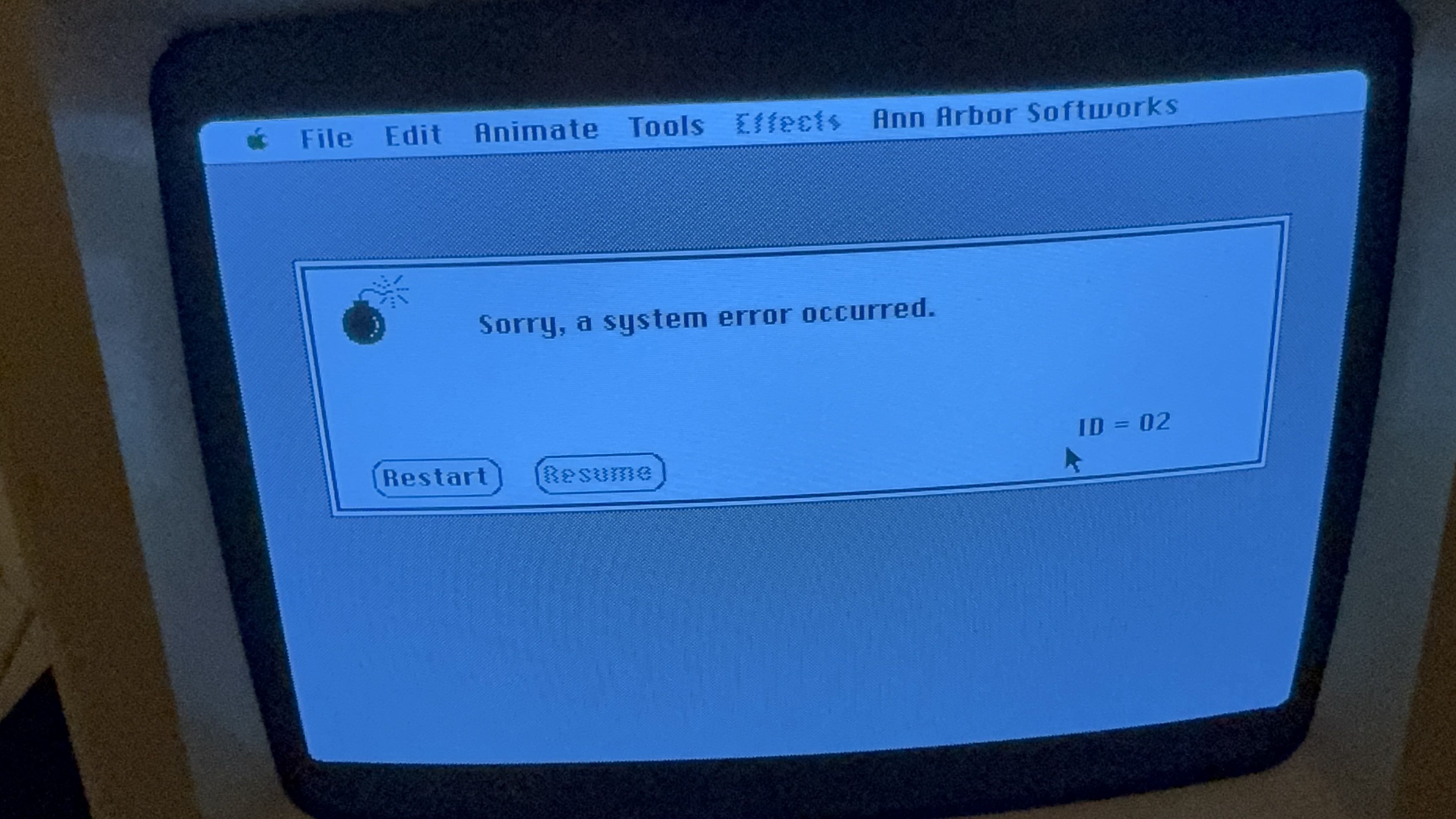 Macintosh Plus showing an address error